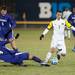 Wolverines Tyler Arnone dribbles the ball down the filed during Thursday nights game against the Niagara Purple Eagles.Courtney Sacco I AnnArbor.com 